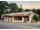 Charming restaurant exterior with outdoor seating, flower boxes, and a vibrant atmosphere at 108 Park Pl # 108, Atlanta, GA 30030