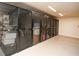 Community storage area with multiple metal mesh storage locker units for residents' convenience at 108 Park Pl # 108, Atlanta, GA 30030