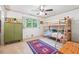 A spacious bedroom featuring bunkbeds, a large window, and playful decor at 2220 Williams Ln, Cumming, GA 30028