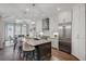 Bright and airy kitchen with a large island, stainless steel appliances, and ample cabinet space at 3450 Commander Cv, Suwanee, GA 30024