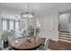 Spacious open floor plan with great flow between the dining room and living area at 3450 Commander Cv, Suwanee, GA 30024