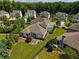 Aerial view of backyard, mature landscaping, and an outdoor seating area with a cozy aesthetic at 4430 Alister Park Dr, Cumming, GA 30040