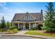 Charming exterior view of a building featuring tasteful landscaping, sidewalk, and manicured lawn at 4430 Alister Park Dr, Cumming, GA 30040