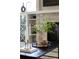 Close-up of decor and the stone fireplace with built-in shelves in a living room at 4430 Alister Park Dr, Cumming, GA 30040