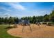Community playground with swings, slides, and bench at 4430 Alister Park Dr, Cumming, GA 30040