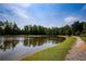 Peaceful pond surrounded by trees at 4430 Alister Park Dr, Cumming, GA 30040