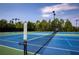 Community tennis court with net at 4430 Alister Park Dr, Cumming, GA 30040