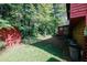 Overgrown backyard with storage shed at 1030 Chapman Ln, Stone Mountain, GA 30088