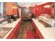 Traditional kitchen features wooden cabinets, a sink, and essential appliances at 1030 Chapman Ln, Stone Mountain, GA 30088