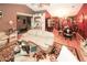 Open-concept living space showcasing hardwood floors, natural light, and seamless transition to the adjacent dining area at 1030 Chapman Ln, Stone Mountain, GA 30088