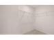 Walk-in closet features wire shelving and neutral paint at 205 Silver Moon Dr, Loganville, GA 30052