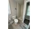 This is a remodeled bathroom, featuring a walk-in shower with tile surround and updated flooring at 2764 Ocean Valley Dr, Atlanta, GA 30349