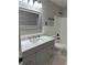 Updated bathroom featuring new vanity, quartz counters, tile flooring and modern fixtures at 2764 Ocean Valley Dr, Atlanta, GA 30349