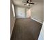 This cozy bedroom features neutral carpeting, a double door closet, and fresh paint at 2764 Ocean Valley Dr, Atlanta, GA 30349