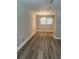 Neutral dining room features wood floors, a chandelier, and large window at 2764 Ocean Valley Dr, Atlanta, GA 30349