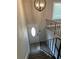 Stylish entryway with iron railing leading downstairs at 2764 Ocean Valley Dr, Atlanta, GA 30349