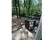 View of the property's modern and efficient outdoor HVAC system on a concrete pad at 2764 Ocean Valley Dr, Atlanta, GA 30349