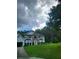 Charming two-story home with stone facade, lush lawn and attached garage at 3939 Craggy Perch, Douglasville, GA 30135