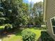Spacious backyard with mature trees and a well-maintained lawn at 10 Vaughan Ne Ct, Cartersville, GA 30121