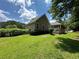 Expansive backyard featuring a screened porch perfect for outdoor relaxation and entertaining at 10 Vaughan Ne Ct, Cartersville, GA 30121