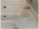 Close-up of the clean white bathtub with jets, highlighting the modern fixtures at 10 Vaughan Ne Ct, Cartersville, GA 30121