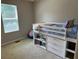 Bedroom including a lofted bed with built-in storage and a playful, organized space at 10 Vaughan Ne Ct, Cartersville, GA 30121