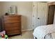 Bedroom featuring neutral walls, and a dark wood dresser at 10 Vaughan Ne Ct, Cartersville, GA 30121