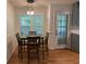 Bright dining area featuring a wood table set and window with a backyard view at 10 Vaughan Ne Ct, Cartersville, GA 30121