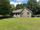 Charming single-story home featuring a covered front porch and lush green lawn at 10 Vaughan Ne Ct, Cartersville, GA 30121