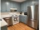 Modern kitchen featuring stainless steel refrigerator and white countertops at 10 Vaughan Ne Ct, Cartersville, GA 30121