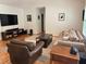 Comfortable living room with sleek media center, contemporary furnishings, and warm hardwood floors at 10 Vaughan Ne Ct, Cartersville, GA 30121