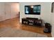 Comfortable living room with sleek media center, contemporary furnishings, and warm hardwood floors at 10 Vaughan Ne Ct, Cartersville, GA 30121