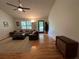 Bright living room with hardwood floors, ceiling fan, and neutral-toned furniture at 10 Vaughan Ne Ct, Cartersville, GA 30121