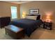 Comfortable bedroom featuring neutral tones, dresser, and a serene atmosphere at 10 Vaughan Ne Ct, Cartersville, GA 30121