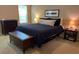 Cozy bedroom with plush bedding, stylish furniture, and ambient lighting at 10 Vaughan Ne Ct, Cartersville, GA 30121