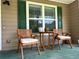 Cozy front porch setup with seating, perfect for enjoying the outdoors at 10 Vaughan Ne Ct, Cartersville, GA 30121