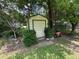 Backyard shed for storing tools and equipment, next to a riding mower at 10 Vaughan Ne Ct, Cartersville, GA 30121