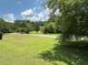 Expansive front yard, partly shaded by a beautiful, mature tree at 10 Vaughan Ne Ct, Cartersville, GA 30121
