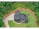 Secluded home with a long driveway nestled in a forest at 2100 Mountain Cove Ct, Woodstock, GA 30188