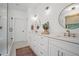 Elegant bathroom with dual vanities, modern fixtures, and a glass-enclosed shower at 2100 Mountain Cove Ct, Woodstock, GA 30188