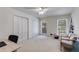 Bright bedroom with three large windows, ample closet space, and neutral decor at 6339 Cornelia Dr, Douglasville, GA 30134