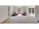 Spacious Living room with neutral carpet and windows for natural light at 6339 Cornelia Dr, Douglasville, GA 30134