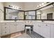 Bright bathroom featuring a double vanity, cabinets, and decor at 775 Gran Heritage Way, Dacula, GA 30019