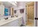 Bathroom featuring a double vanity, shower, and toilet at 775 Gran Heritage Way, Dacula, GA 30019