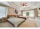 Spacious bedroom with tray ceiling, carpet, and two twin beds offering a relaxing retreat at 775 Gran Heritage Way, Dacula, GA 30019