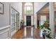 Elegant foyer featuring hardwood floors, soaring ceilings, and an abundance of natural light at 775 Gran Heritage Way, Dacula, GA 30019