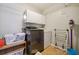 Laundry room with washer, dryer, storage cabinets and shelving at 775 Gran Heritage Way, Dacula, GA 30019