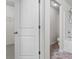 Bathroom with white shower and tile floor at 173 Oakland Hills Way, Lawrenceville, GA 30044