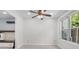 Dining area featuring neutral walls, a ceiling fan, and a window with natural light at 173 Oakland Hills Way, Lawrenceville, GA 30044