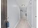 Inviting entrance hall with light wood floors and neutral wall paint at 173 Oakland Hills Way, Lawrenceville, GA 30044